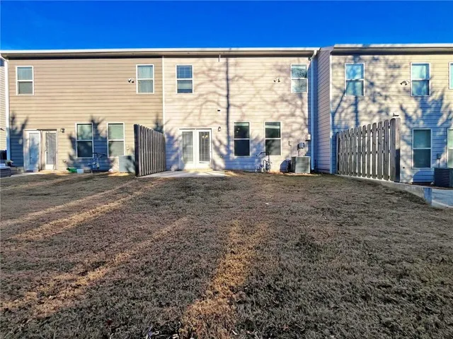 a view of front door with yard