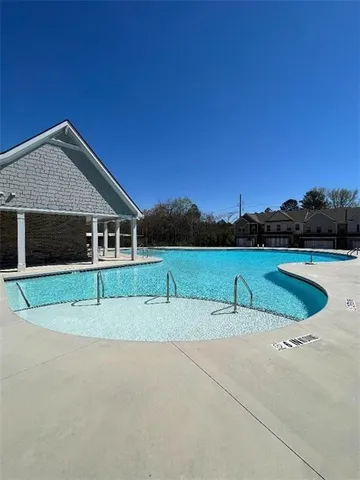 a view of a house with a swimming pool