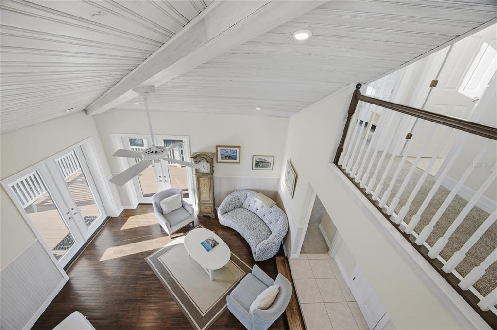 5010 Grouper Hole Court Boca Grande, FL 33921 - Photo 29 of 69 a view of a livingroom with furniture and wooden floor
