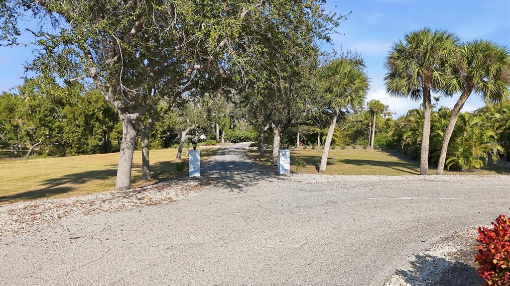 5010 Grouper Hole Court Boca Grande, FL 33921 - Photo 30 of 69 a view of a park with slide