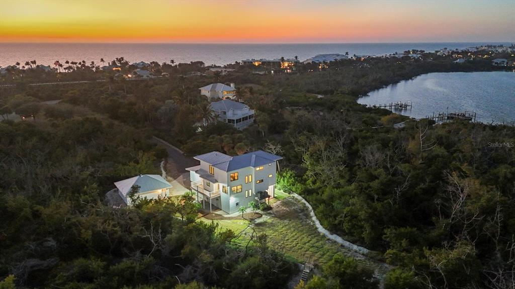 5010 Grouper Hole Court Boca Grande, FL 33921 - Photo 3 of 69 a view of a lake in middle of the town