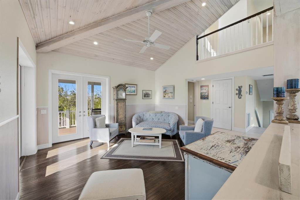 5010 Grouper Hole Court Boca Grande, FL 33921 - Photo 32 of 69 a living room with furniture and wooden floor