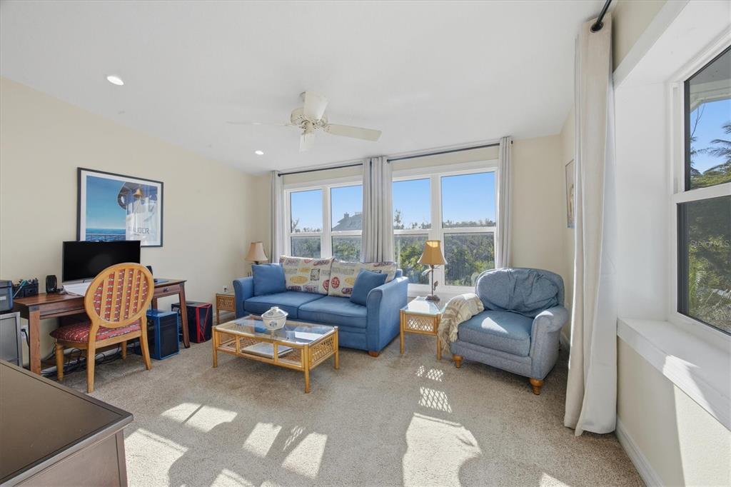 5010 Grouper Hole Court Boca Grande, FL 33921 - Photo 43 of 69 a living room with furniture and a window