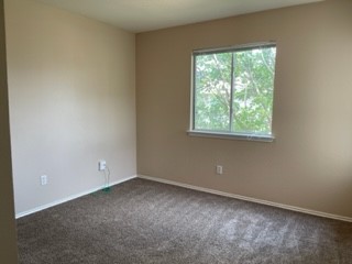 14112 Harris Ridge Boulevard, Unit B Pflugerville, TX 78660 - Photo 3 of 16 an empty room with a window