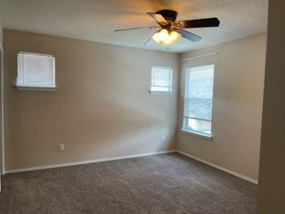 14112 Harris Ridge Boulevard, Unit B Pflugerville, TX 78660 - Photo 5 of 16 a view of an empty room with a window