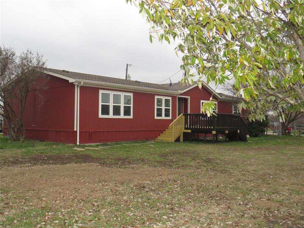 2151 Crockett Road Sanger, TX 76266 - Photo 1 of 30 a view of a house with a yard