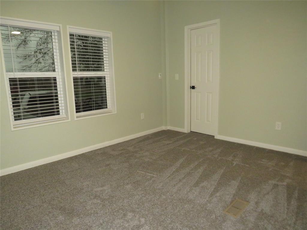 2151 Crockett Road Sanger, TX 76266 - Photo 14 of 30 a view of an empty room with a window