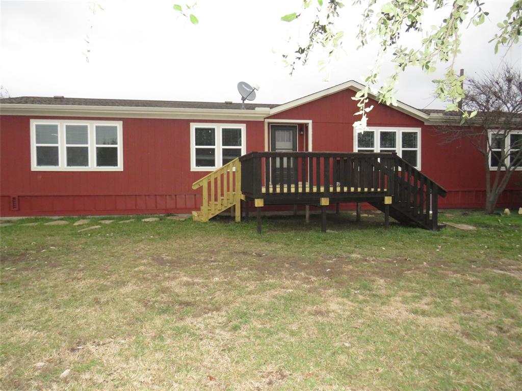 2151 Crockett Road Sanger, TX 76266 - Photo 2 of 30 front view of a house with a yard