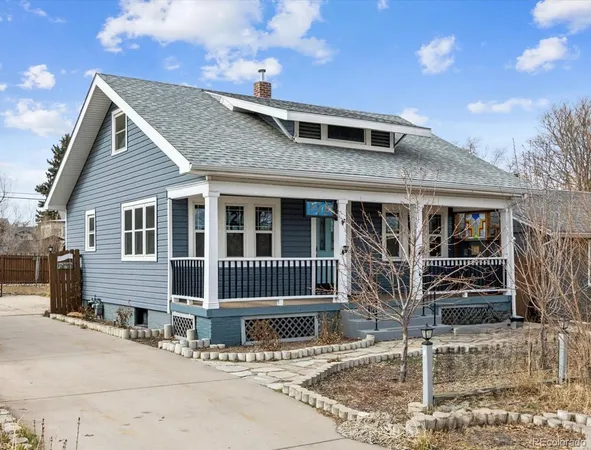 a front view of a house with garage