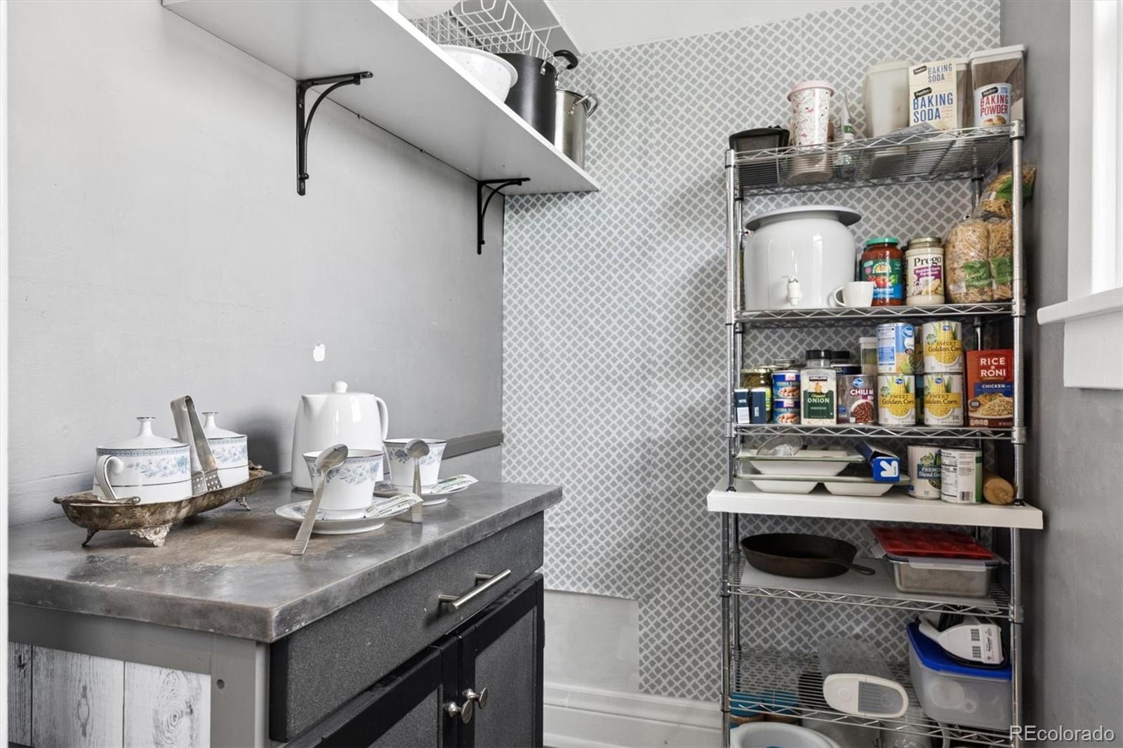 1275 Clinton Street Aurora, CO 80010 - Photo 18 of 33 a kitchen with stainless steel appliances granite countertop a sink and cabinets