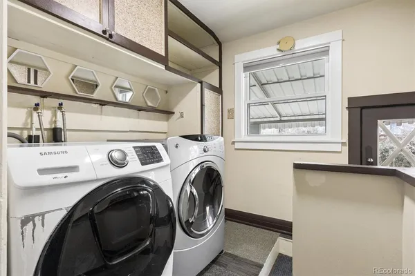 a utility room with dryer and washer