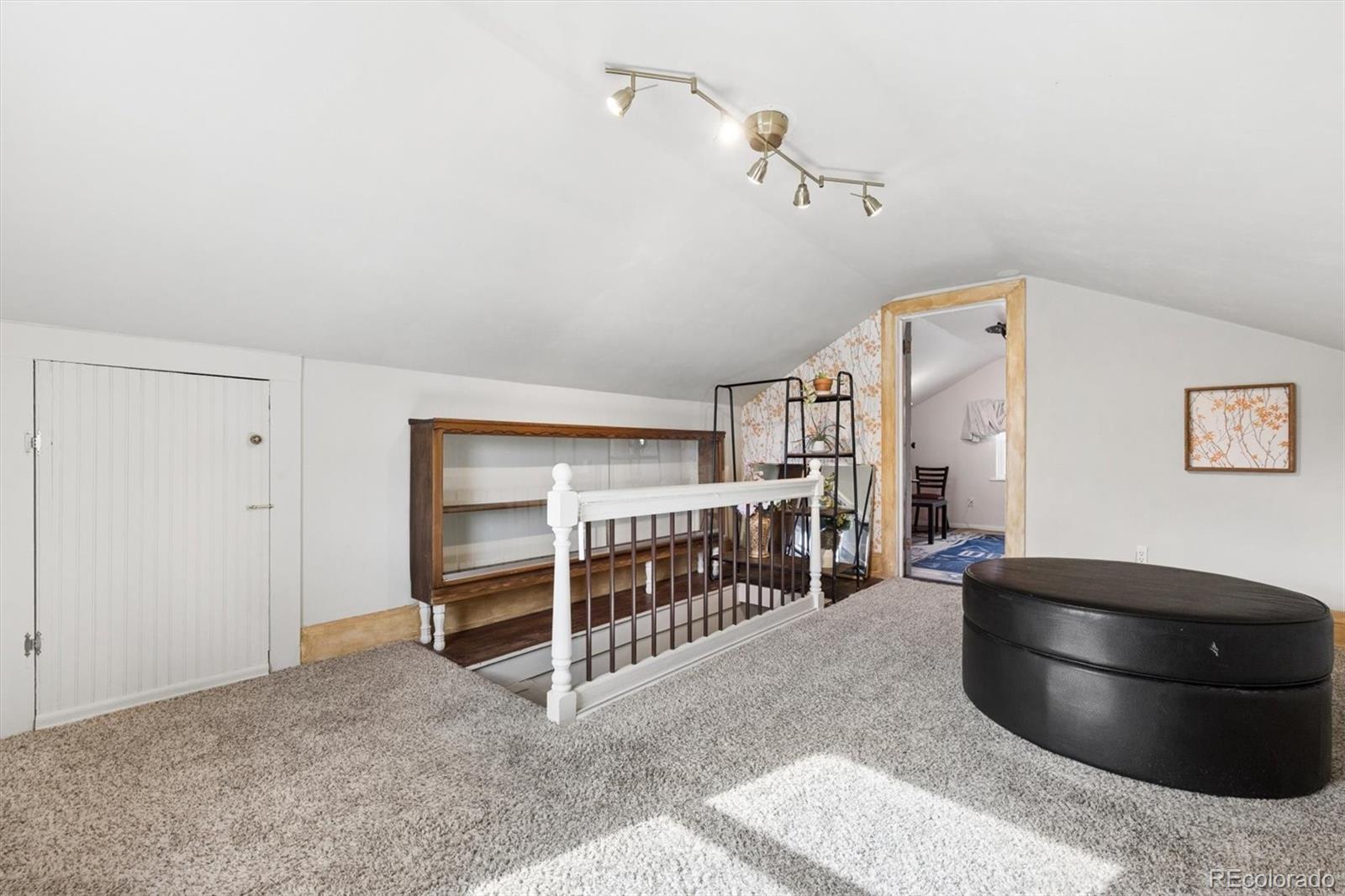 1275 Clinton Street Aurora, CO 80010 - Photo 22 of 33 a living room with furniture