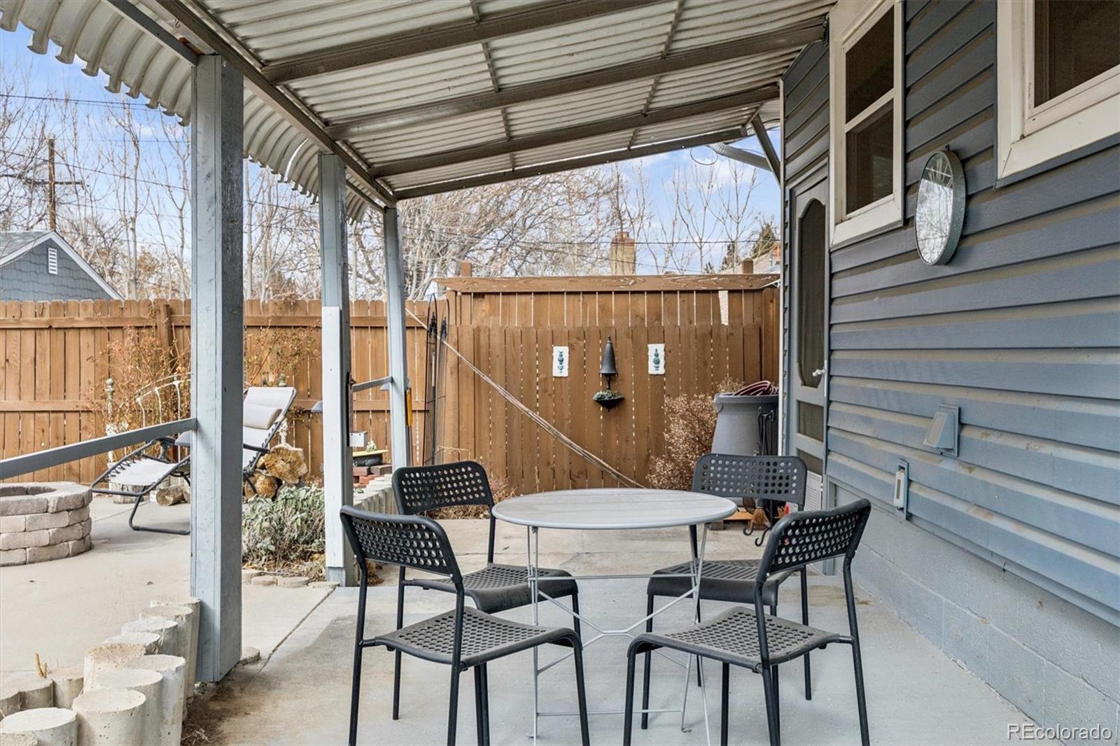 1275 Clinton Street Aurora, CO 80010 - Photo 27 of 33 a view of a outdoor seating area