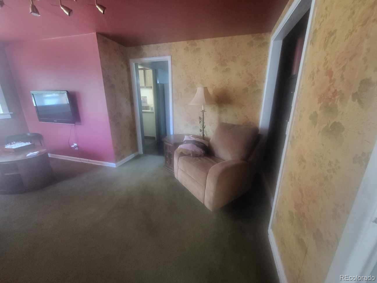 1275 Clinton Street Aurora, CO 80010 - Photo 31 of 33 a view of livingroom with window