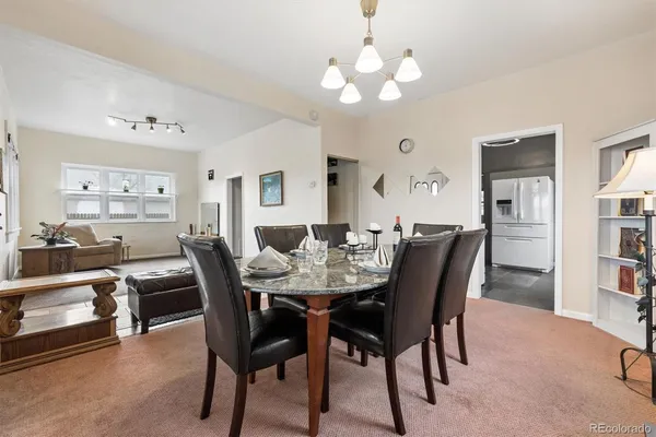 a view of a dining room with furniture