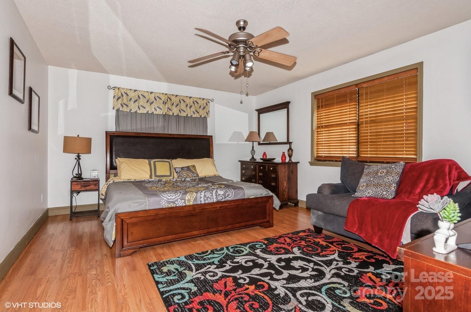 9938 Sandra Lane Fort Mill, SC 29707 - Photo 15 of 36 a bedroom with a bed and window