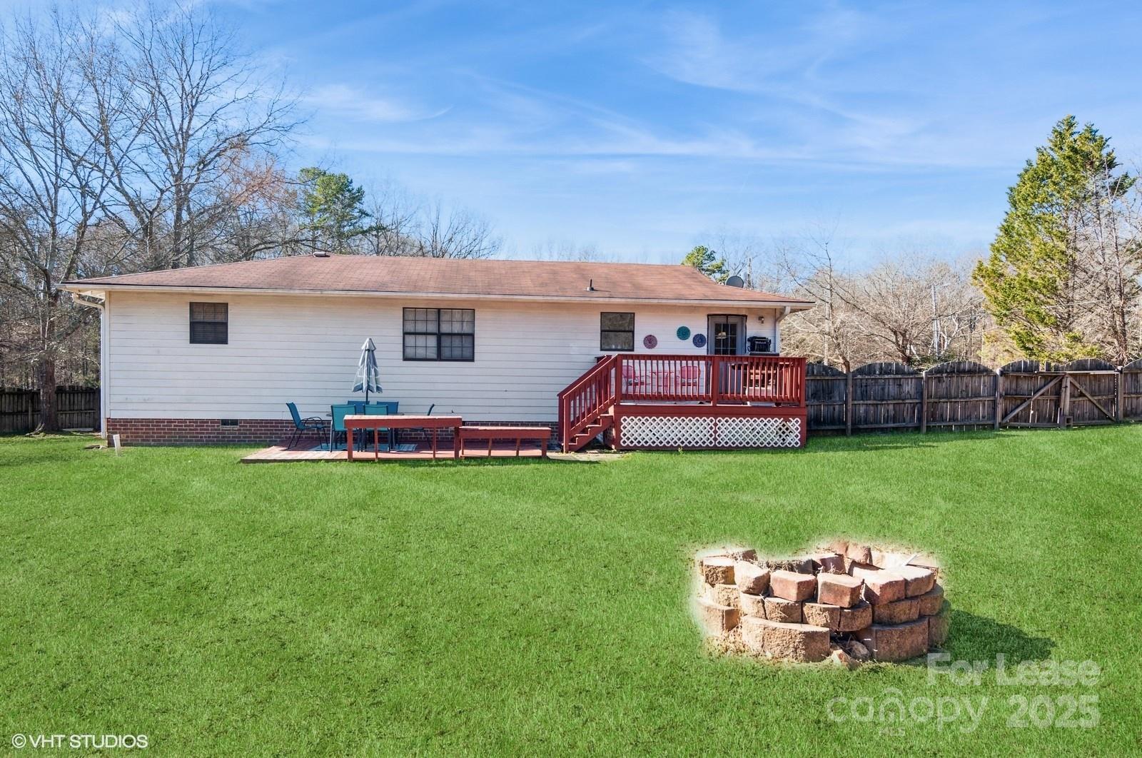 9938 Sandra Lane Fort Mill, SC 29707 - Photo 31 of 36 a front view of house with yard and trees in the background