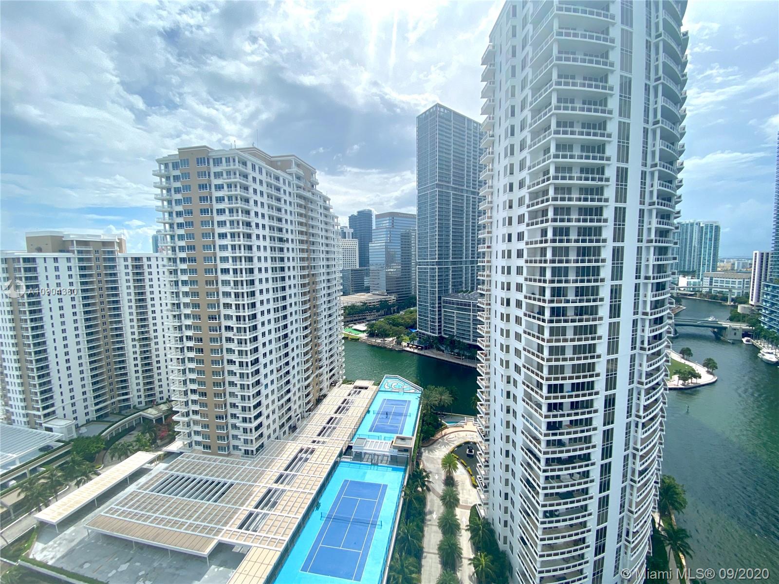 900 Brickell Key Boulevard, Unit 2001 Miami, FL 33131 - Photo 17 of 22 a view of a city with tall buildings