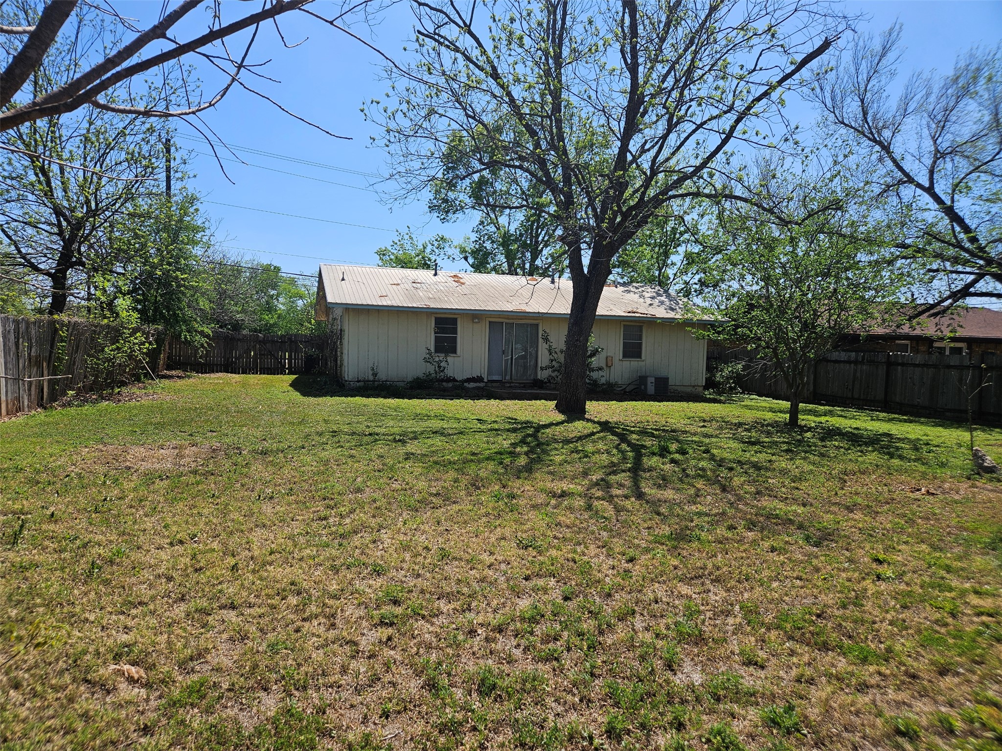 1001 West 17th Street Georgetown, TX 78626 - Photo 10 of 10 Back of property featuring a fenced backyard