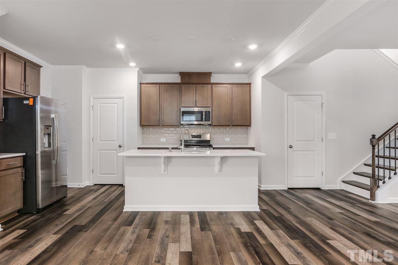 6530 Mezzo Lane Raleigh, NC 27616 - Photo 5 of 20 Photos are of model home. Options and colors will vary.