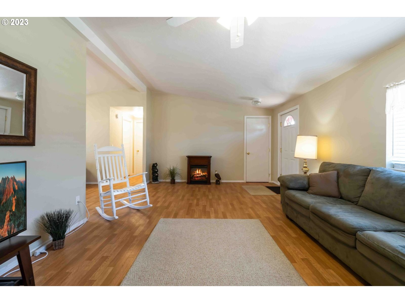 150 North 11th Street Lakeside, OR 97449 - Photo 13 of 24 a living room with furniture and a wooden floor