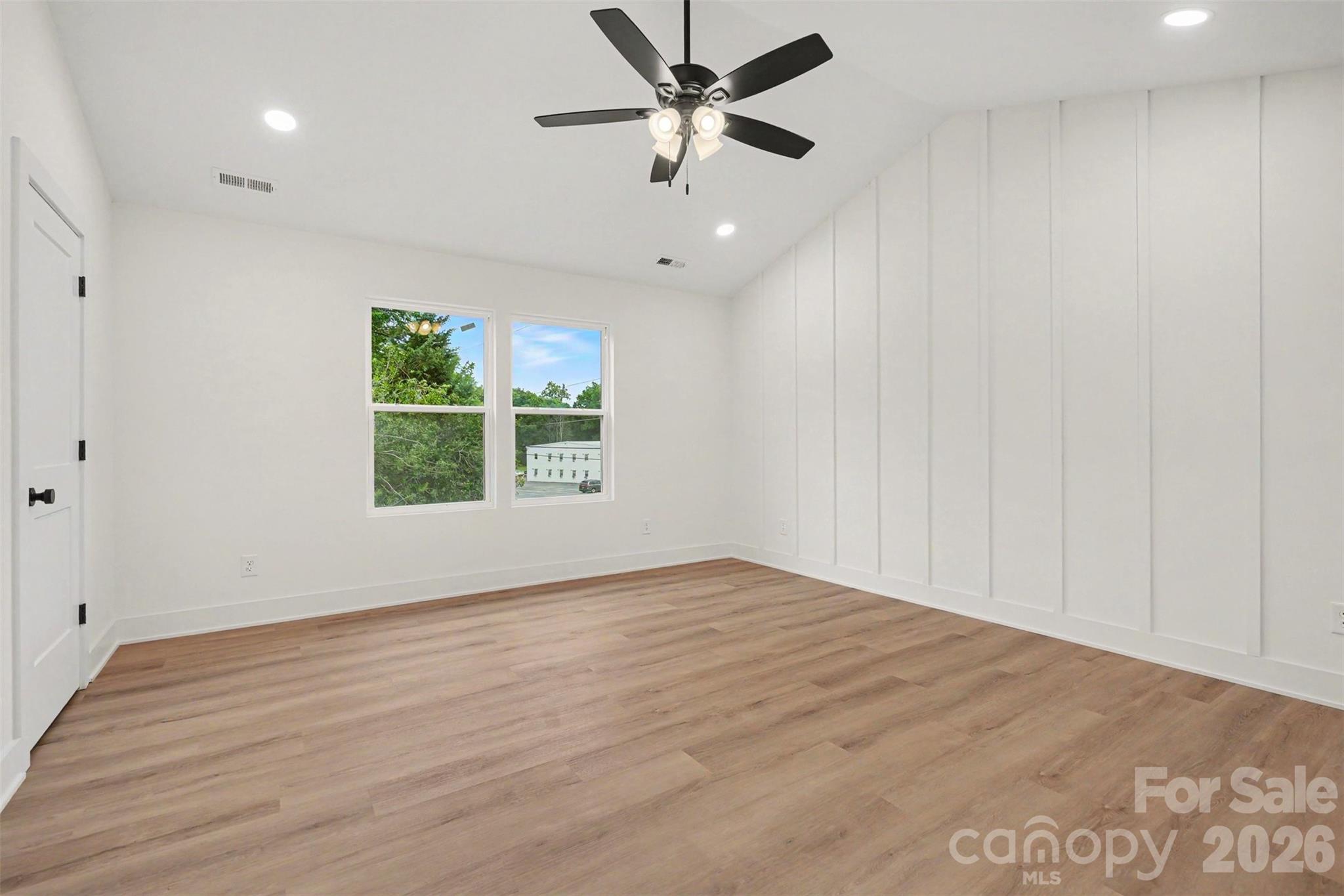 7521 Lawyers Road Charlotte, NC 28227 - Photo 20 of 35 wooden floor in an empty room with a window