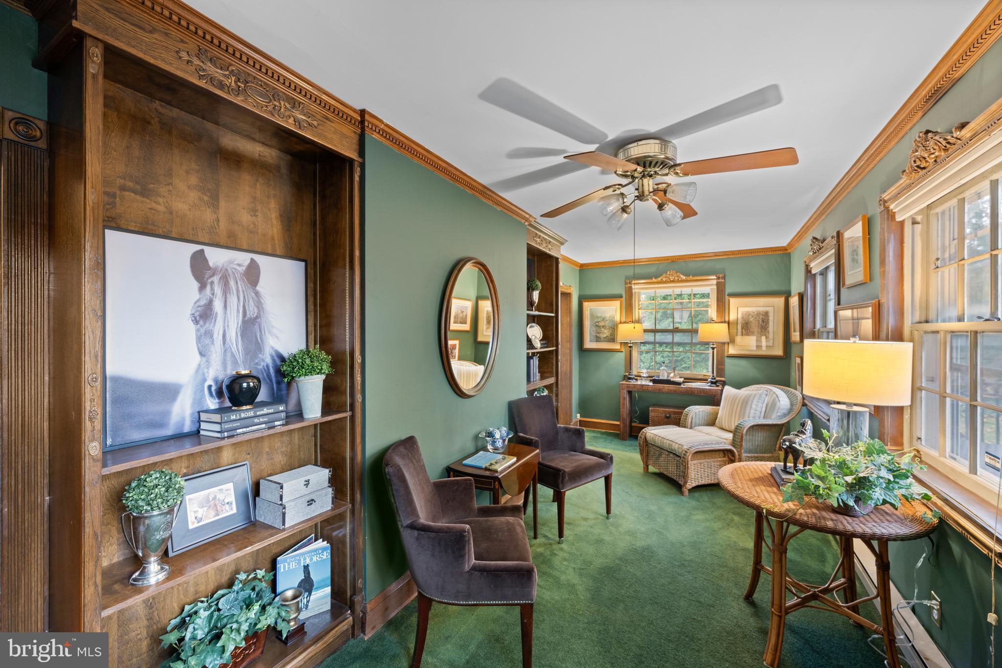 328 Conestoga Road Wayne, PA 19087 - Photo 15 of 72 a living room filled with furniture and a clock