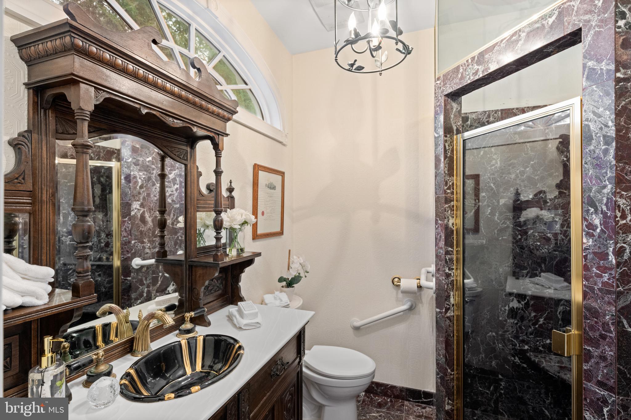 328 Conestoga Road Wayne, PA 19087 - Photo 21 of 72 a bathroom with a sink a toilet and shower
