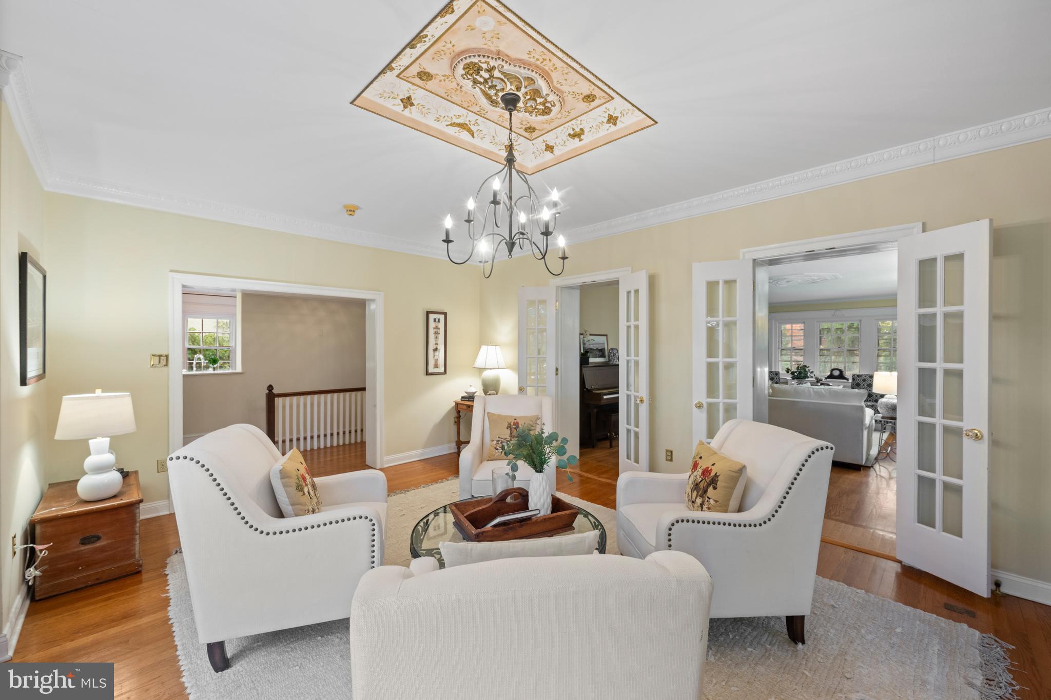 328 Conestoga Road Wayne, PA 19087 - Photo 22 of 72 a living room with furniture and a chandelier