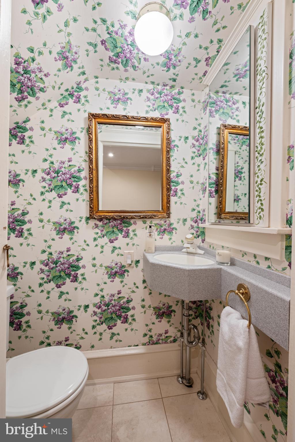 328 Conestoga Road Wayne, PA 19087 - Photo 34 of 72 a bathroom with a sink and a mirror
