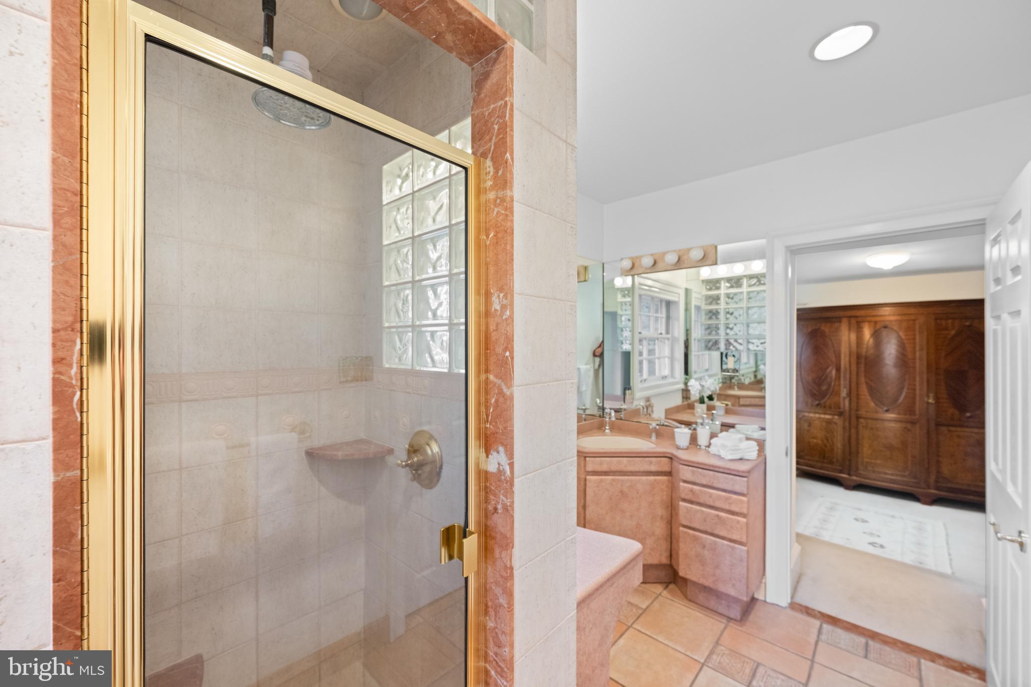 328 Conestoga Road Wayne, PA 19087 - Photo 47 of 72 a bathroom with a tub shower and sink