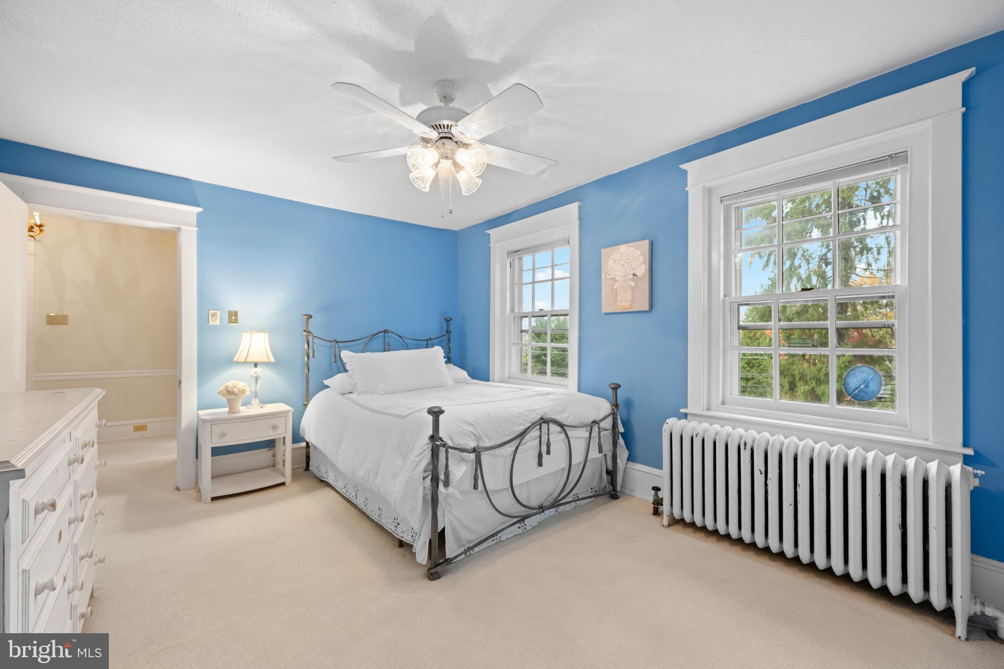 328 Conestoga Road Wayne, PA 19087 - Photo 50 of 72 a spacious bedroom with a bed and a window