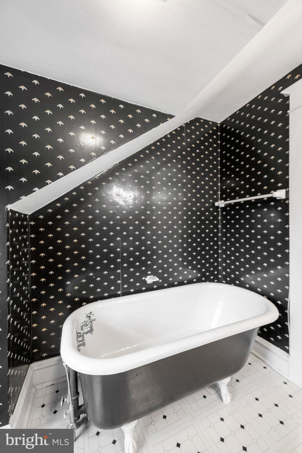 328 Conestoga Road Wayne, PA 19087 - Photo 59 of 72 a bathroom with a bathtub and a shower