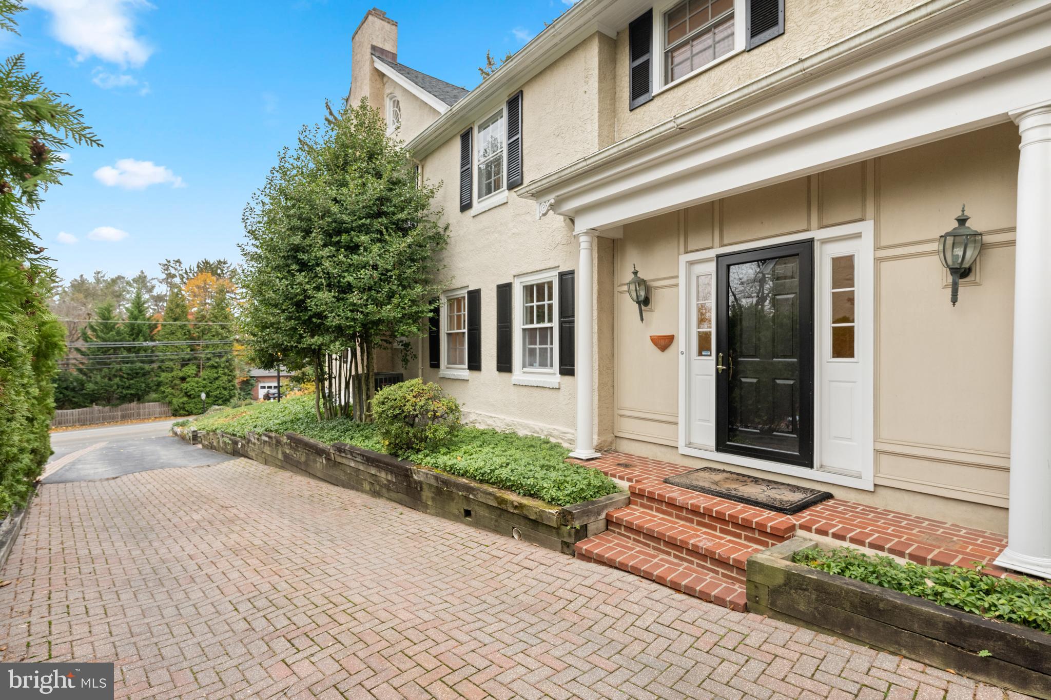 328 Conestoga Road Wayne, PA 19087 - Photo 68 of 72 front view of a house with a yard