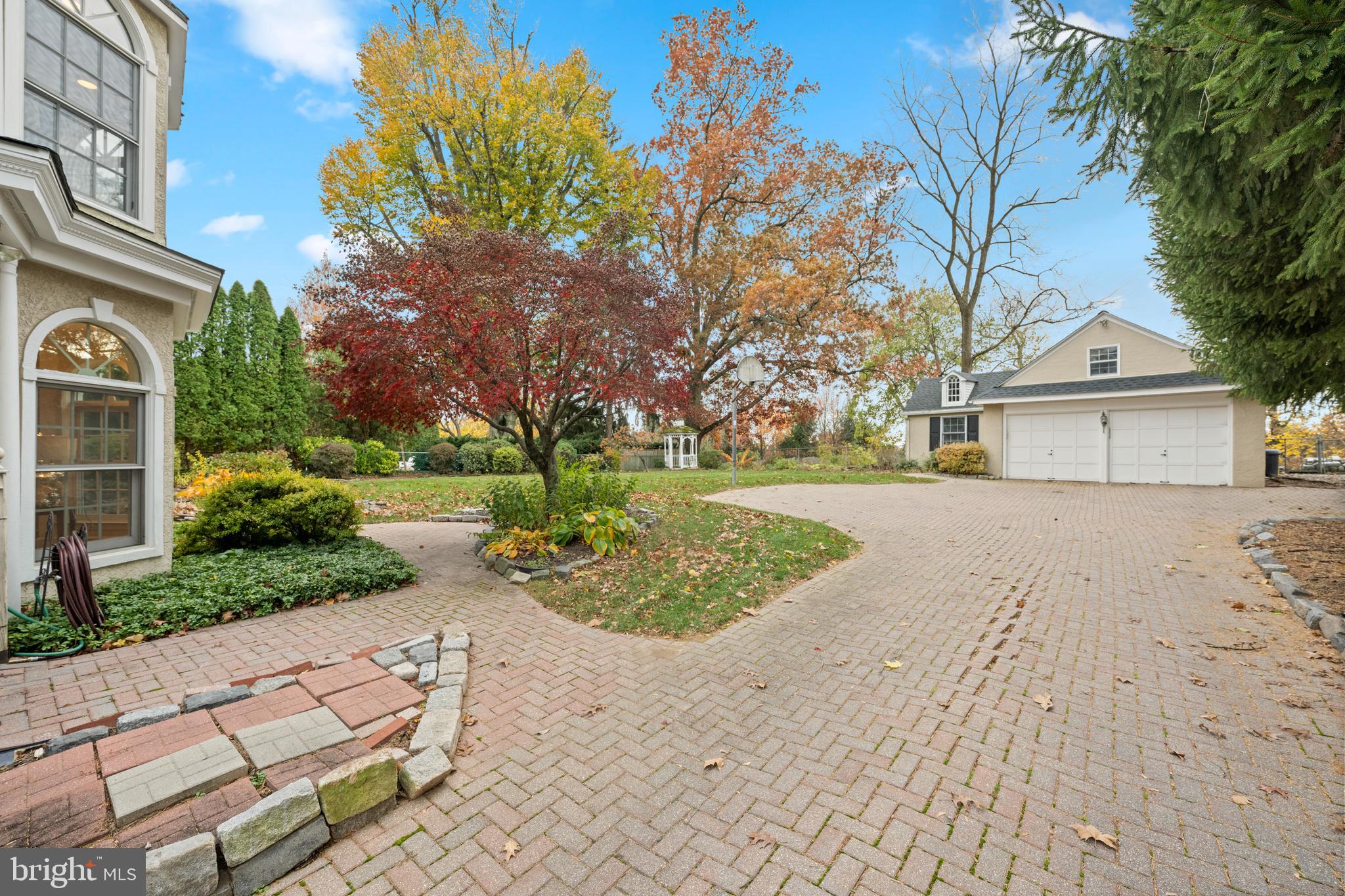 328 Conestoga Road Wayne, PA 19087 - Photo 70 of 72 a view of a yard with plants and trees