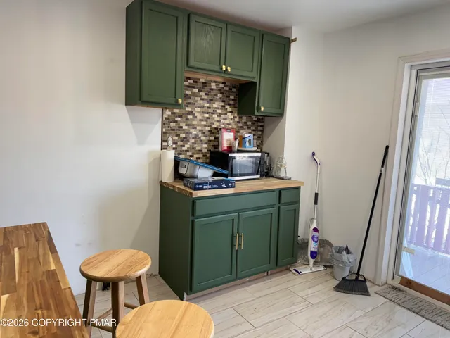 a room with furniture and a mirror