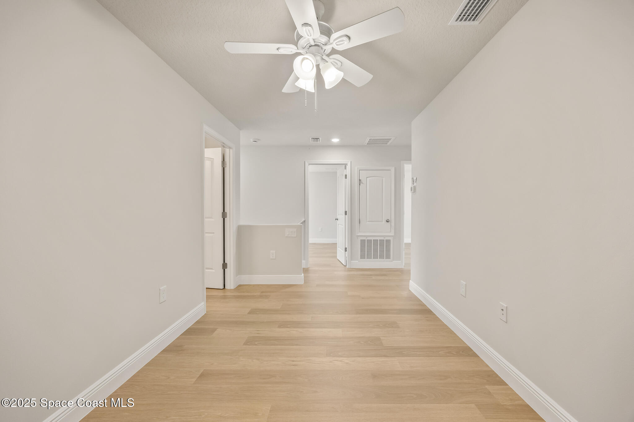 207 Hidden Woods Place Melbourne, FL 32901 - Photo 19 of 33 a view of an empty room with a window