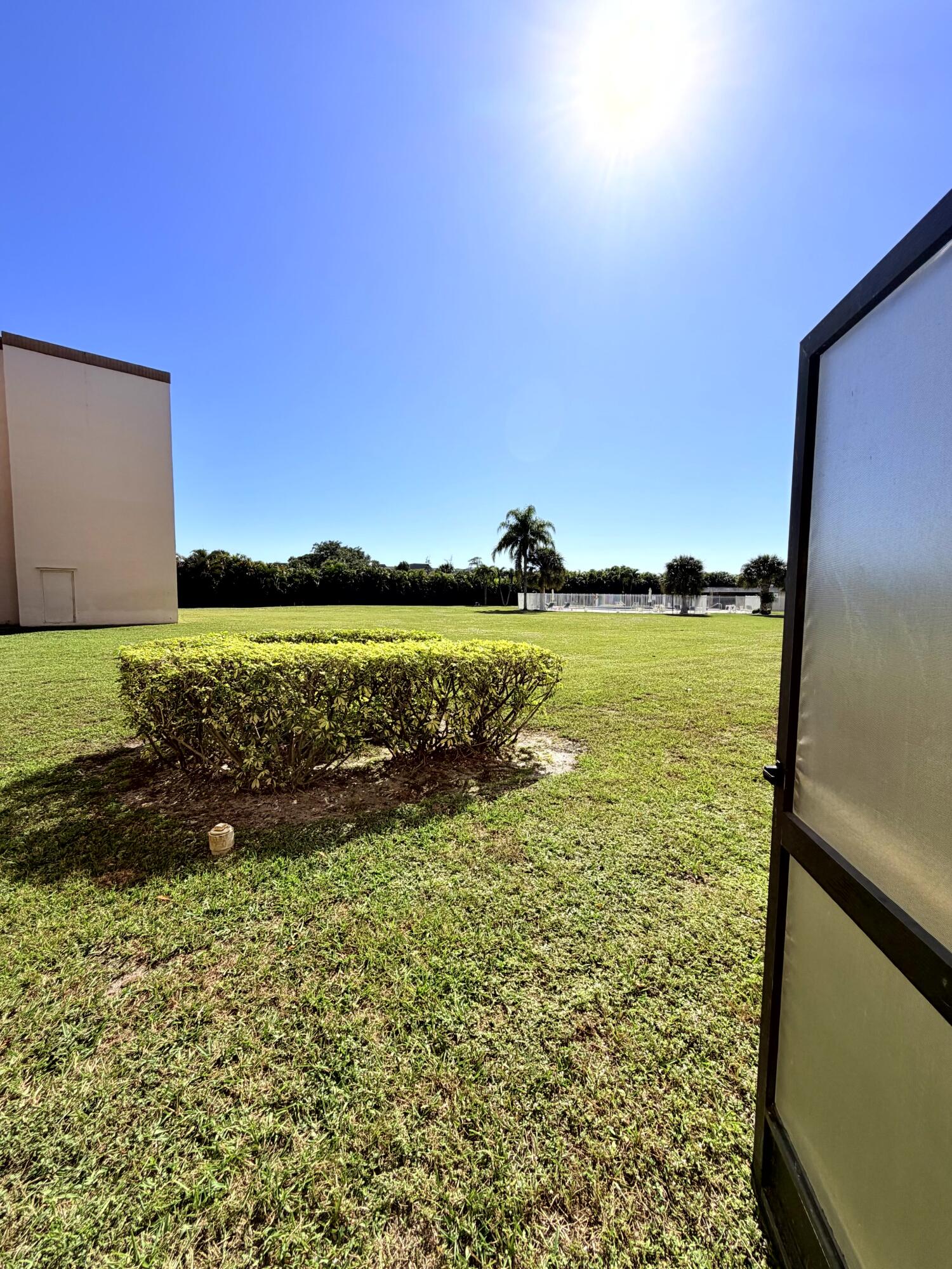 9300 Southwest 8th Street, Unit 107 Boca Raton, FL 33428 - Photo 19 of 23 Back Yard / Pool