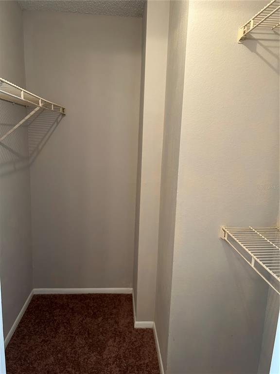 241 Afton Square, Unit 304 Altamonte Springs, FL 32714 - Photo 11 of 17 a view of a room with rack on the wall