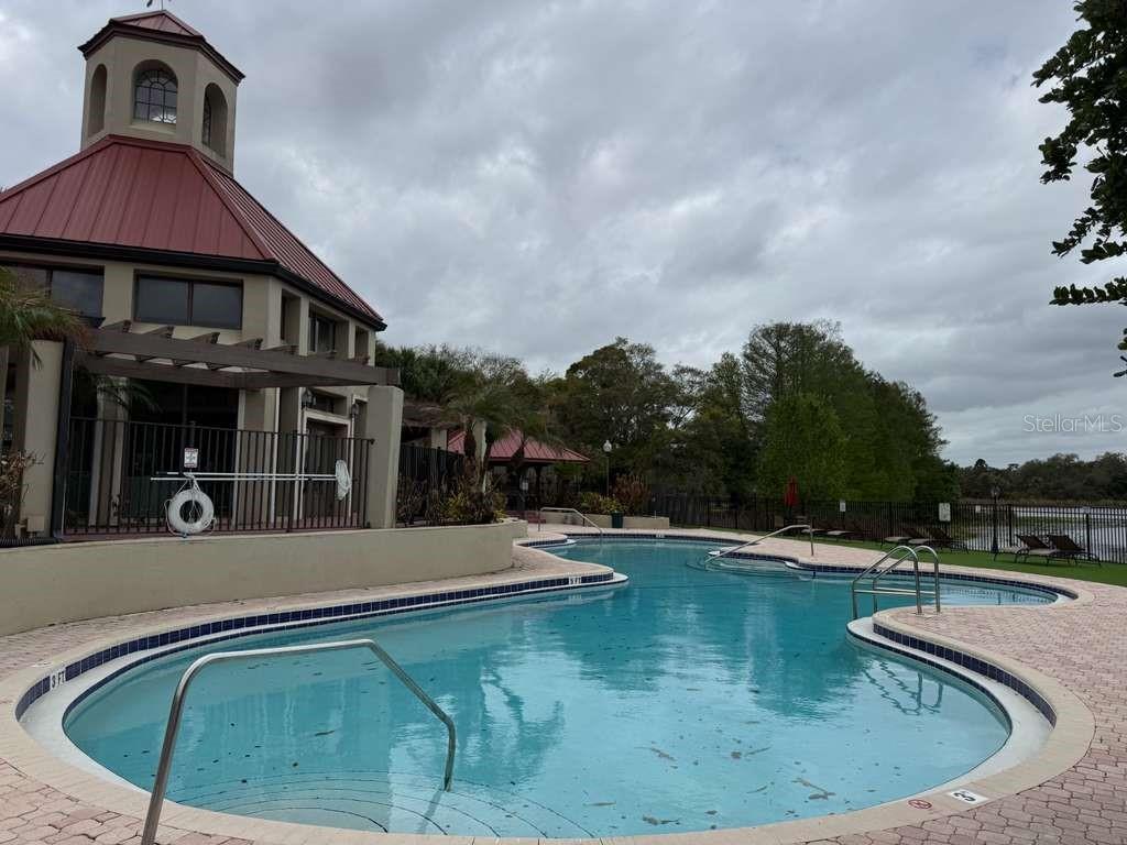 241 Afton Square, Unit 304 Altamonte Springs, FL 32714 - Photo 12 of 17 a view of a house with swimming pool