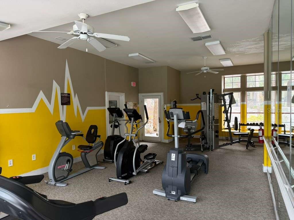 241 Afton Square, Unit 304 Altamonte Springs, FL 32714 - Photo 17 of 17 a view of a room with gym equipment