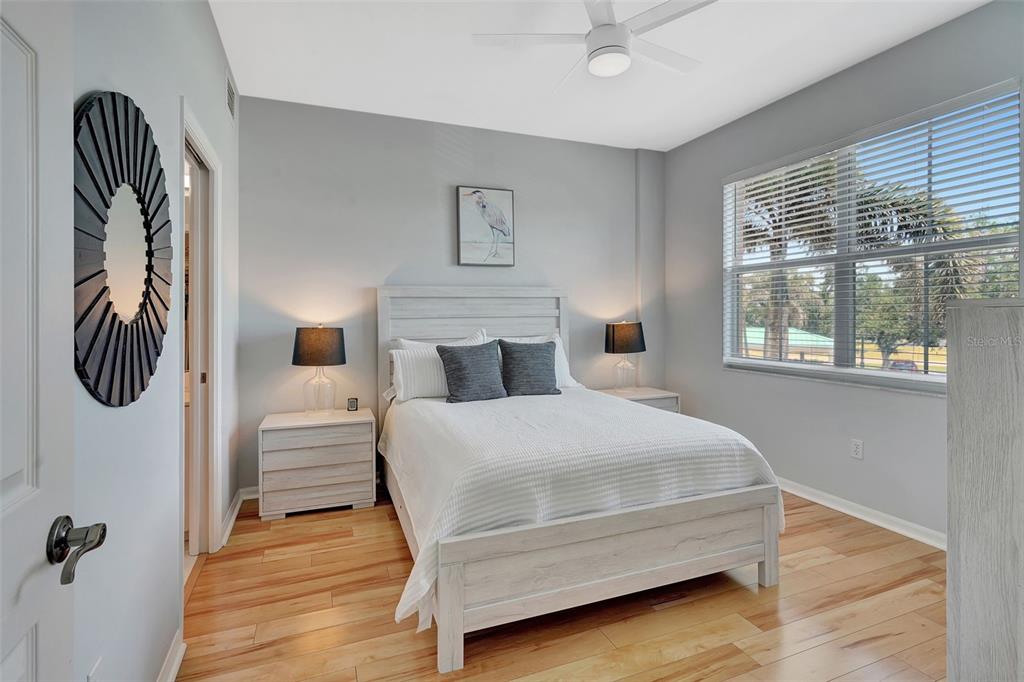 2090 Matecumbe Key Road, Unit 1207 Punta Gorda, FL 33955 - Photo 13 of 23 a bedroom with a bed and window