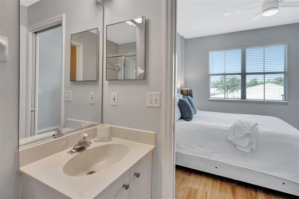 2090 Matecumbe Key Road, Unit 1207 Punta Gorda, FL 33955 - Photo 19 of 23 a bathroom with a sink and a mirror