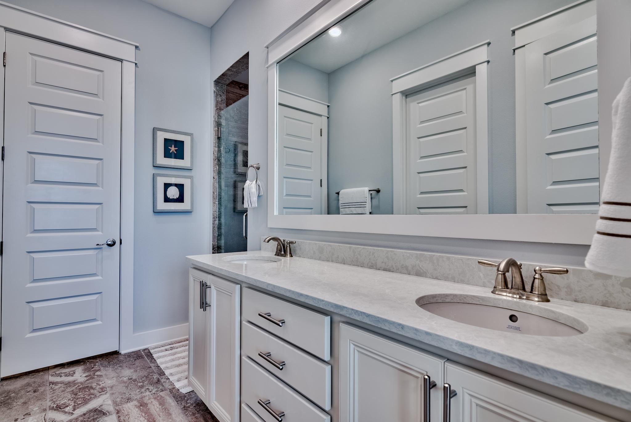94 Milestone Drive Inlet Beach, Unit C Inlet Beach, FL 32461 - Photo 10 of 41 a bathroom with a sink and a mirror