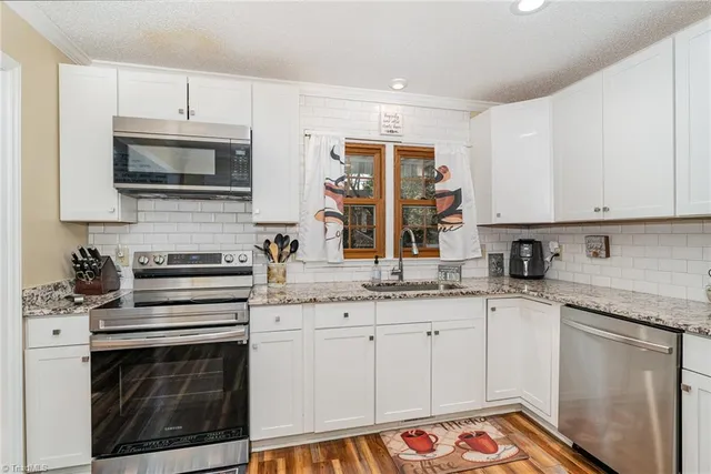 $454,900 | 6003 Muirfield Drive, Greensboro, NC 27410