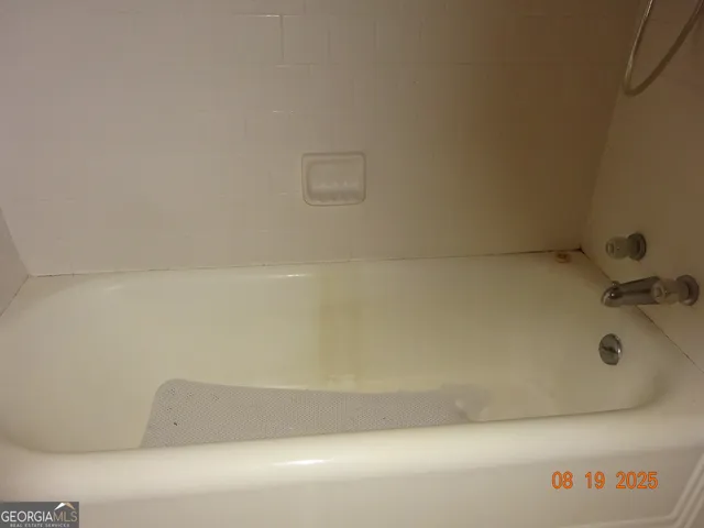 a bathroom with a bathtub