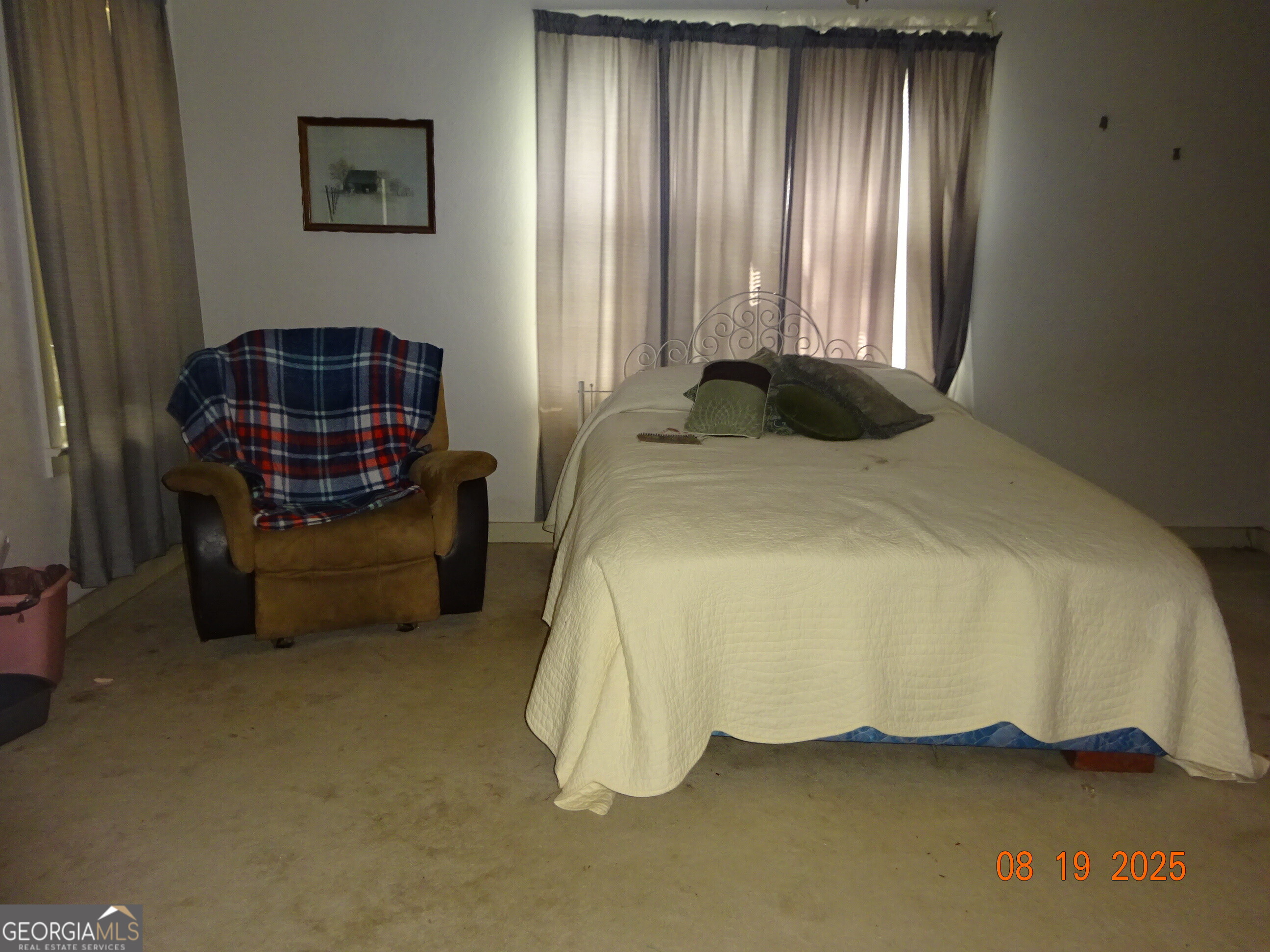 6 North Spring Street Claxton, GA 30417 - Photo 14 of 26 a bedroom with a bed and a window