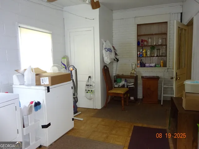 a view of a room with shelves