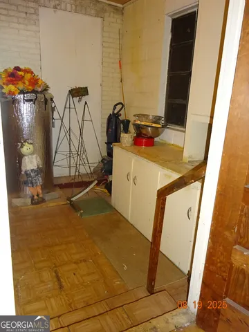 a front view of a house with a garden and yard