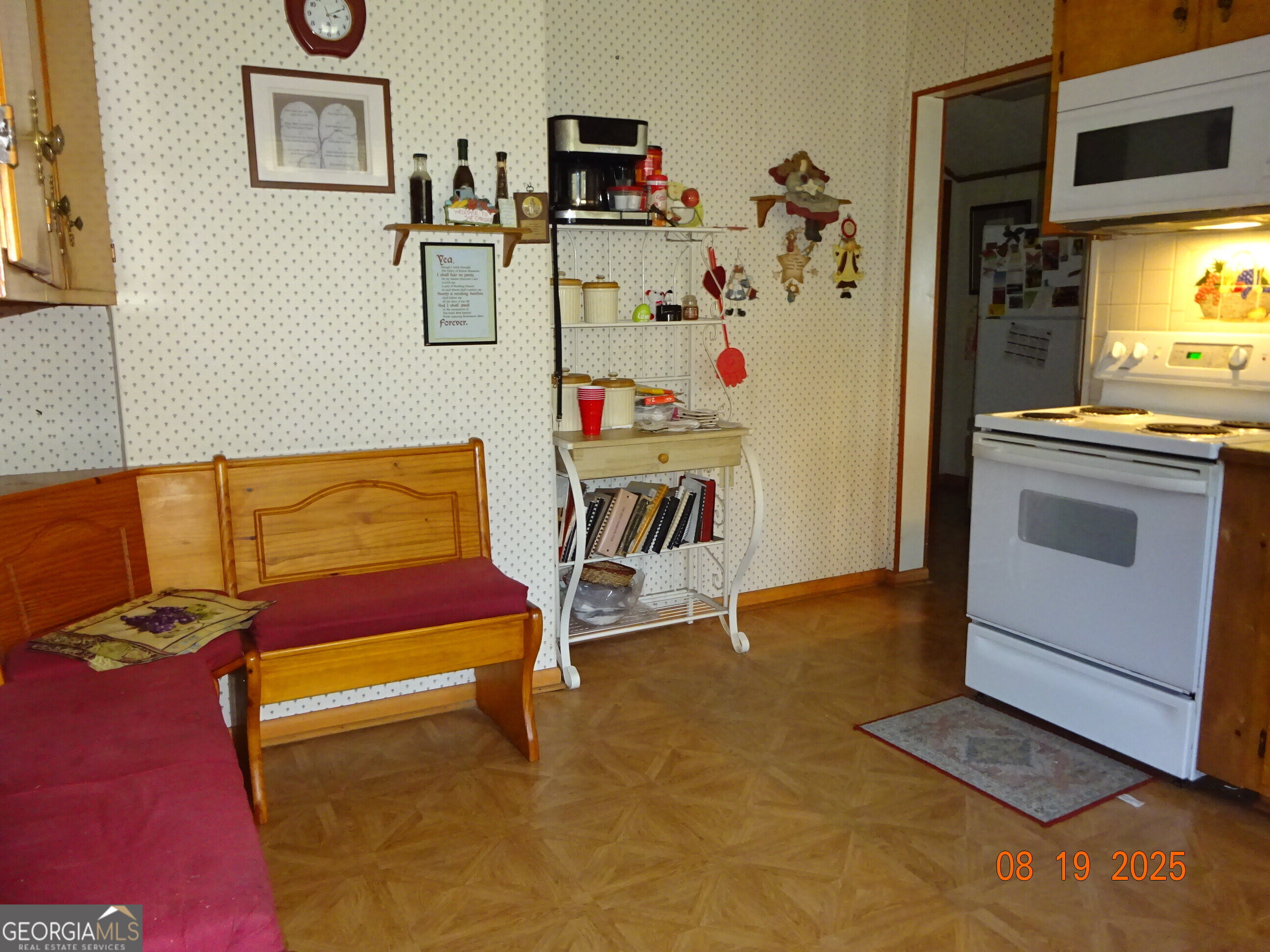 6 North Spring Street Claxton, GA 30417 - Photo 8 of 26 a view of a livingroom with furniture and a flat screen tv
